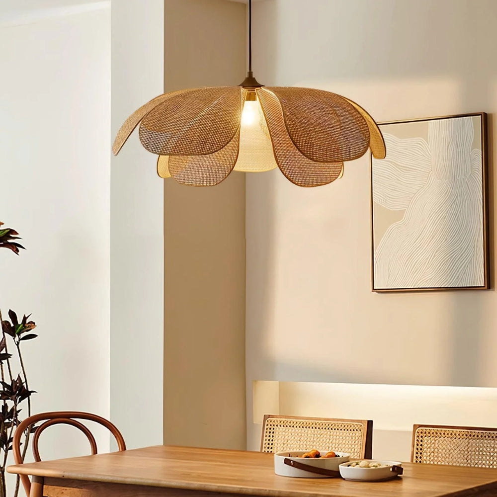 Premium eco-resort natural straw hanging lamp casting a warm amber glow, ideal for adding a peaceful zen atmosphere to a dining space.