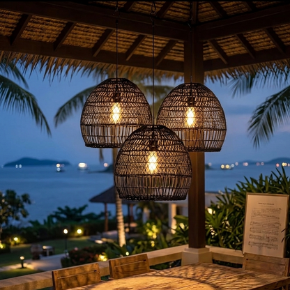 Artisanal dark rattan hanging lamp perfect for artistic beach resort interiors