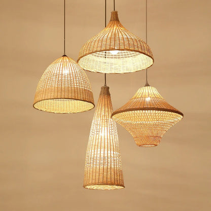 A mixed set of four assorted rattan pendant lights in various geometric shapes hanging at staggered levels