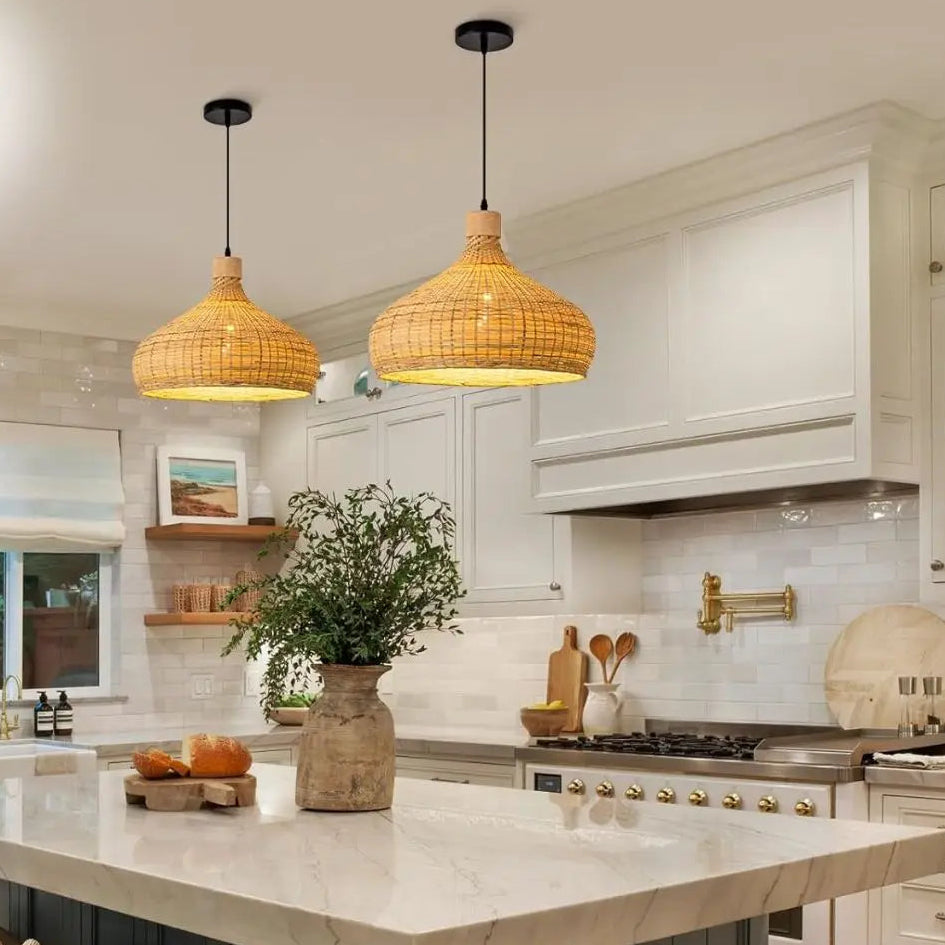 Bamboo dome pendant light casting a gentle glow over a modern kitchen island setup.