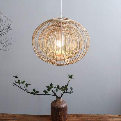 Ceiling pendant highlighting raw organic bamboo sphere materials for a minimalist earthy home aesthetic.