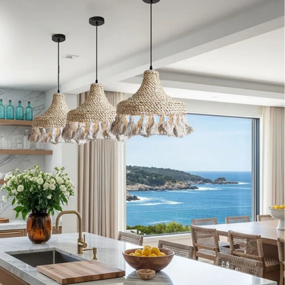 Coastal farmhouse style tassel pendant light perfect for creating a serene beach house theme.
