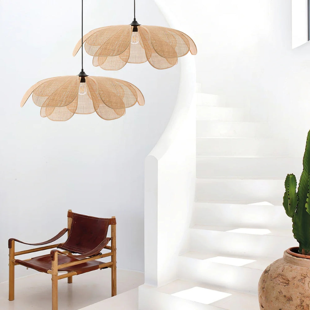 Tropical flared wicker blossom chandelier creating a fresh, warm, and breezy coastal resort feel in a neutral-toned residential space