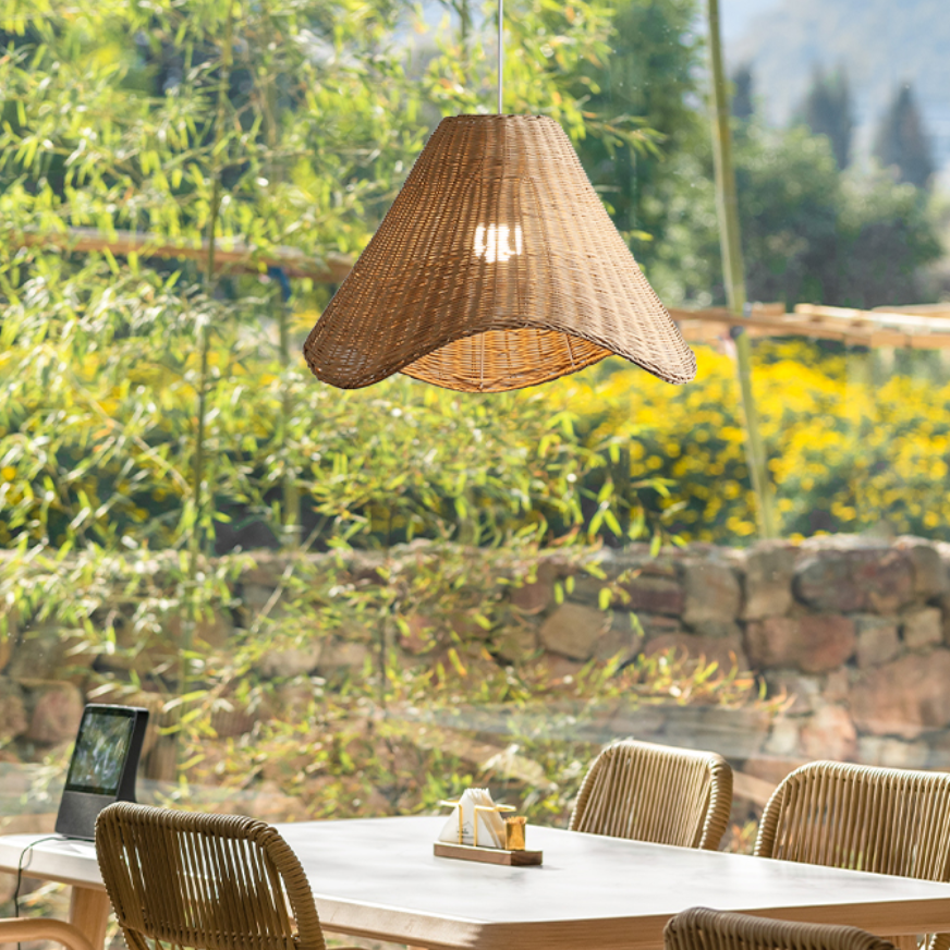 Decorative woven pendant light fixture adding rustic charm to cafe interiors
