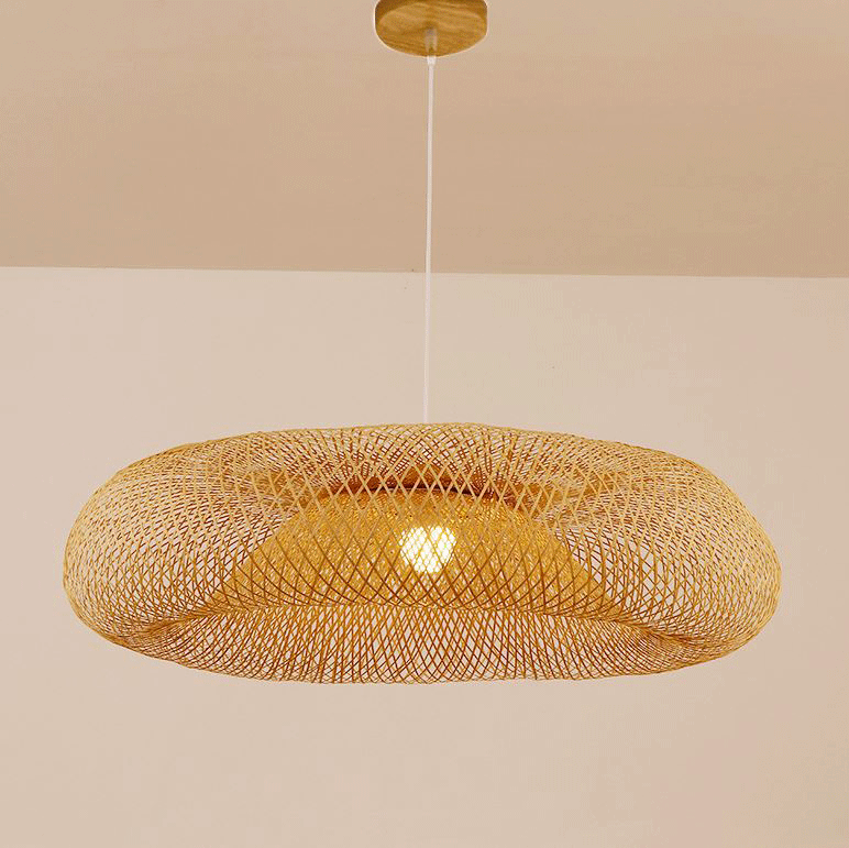 Round wicker ceiling fixture with an elegant dual-layer concentric mesh weave diffusing a warm amber glow.