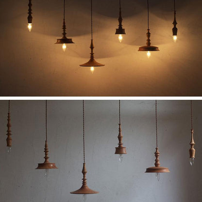 Drop light in Retro style, crafted from turned wood, perfect for clean, sophisticated interior design aesthetics.