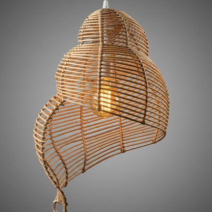 Earth-friendly rattan artistic hanging light, a handwoven decorative fixture designed for home wellness.