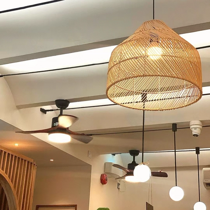 Eco-chic hand-wrapped rattan pendant, a sophisticated minimalist accent for sustainable interior styling.