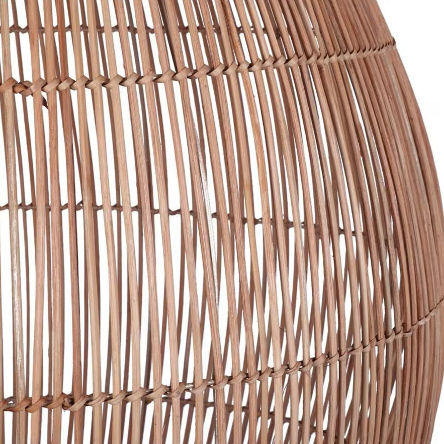 Premium woven cane cocoon lamp blending traditional Asian basket weaving techniques with clean Nordic geometric shapes.