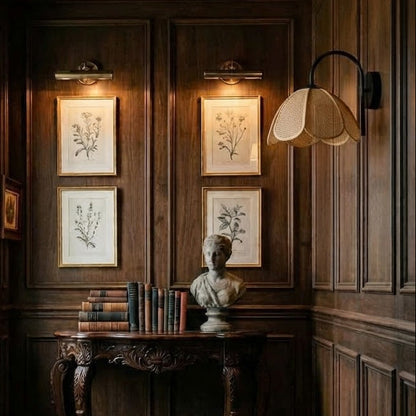 Elegant entryway warm lighting using a decorative gooseneck rattan light