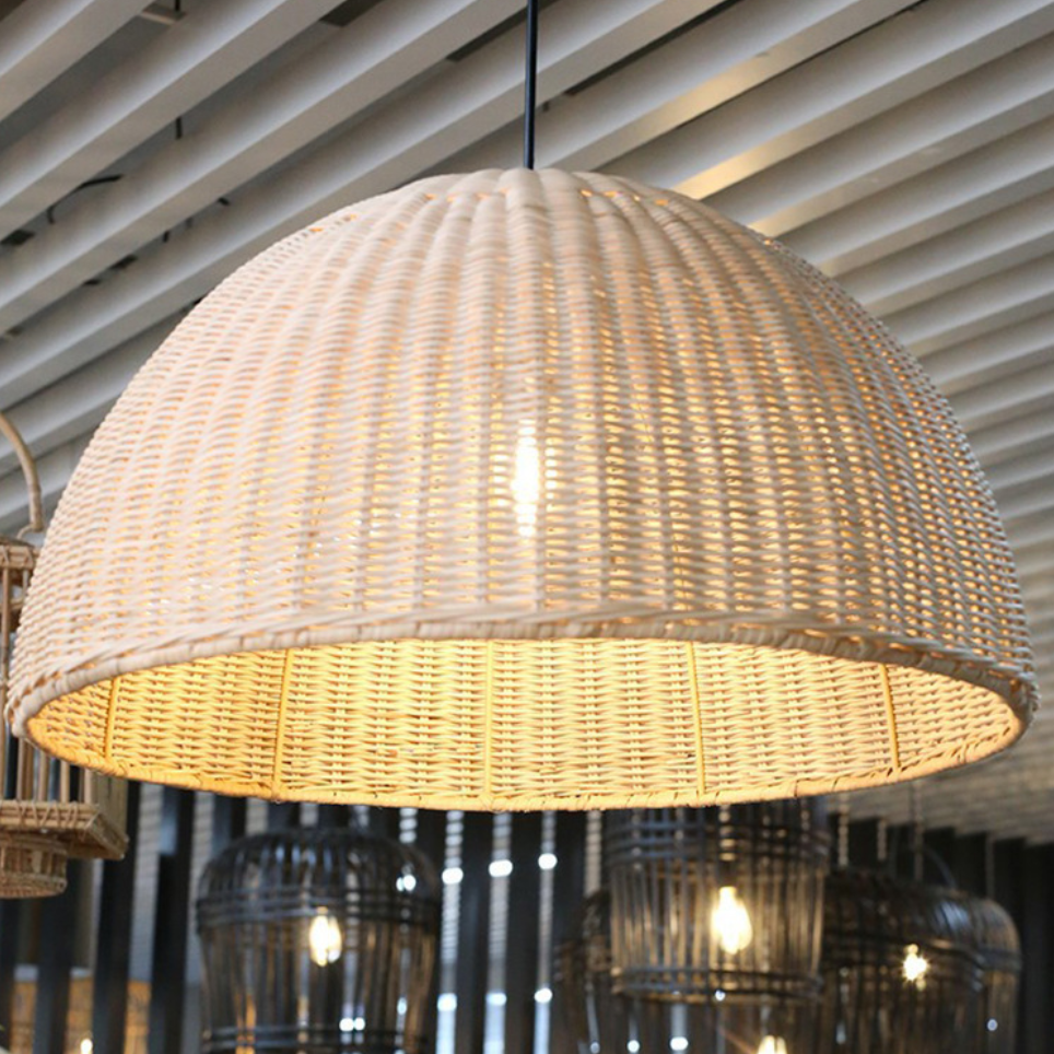 Hand-selected sustainable rattan dome lamp showing natural material texture