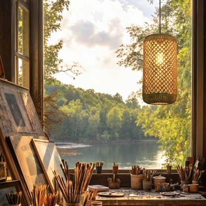 Handcrafted cylindrical jute light illuminating an inspiring art studio