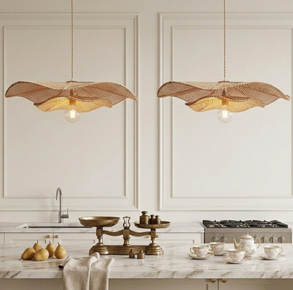 Handcrafted rattan leaf pendant lamp as a statement piece for kitchen island