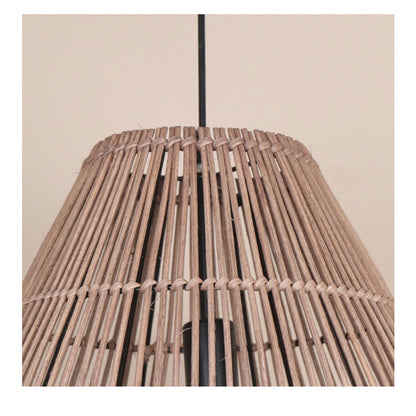 Artisan woven bamboo light highlighting the raw texture and fine spacing of sustainable handcrafted organic fibers.