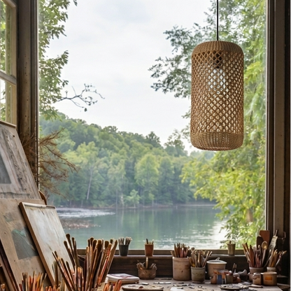 Handcrafted cylindrical jute light illuminating an inspiring art studio
