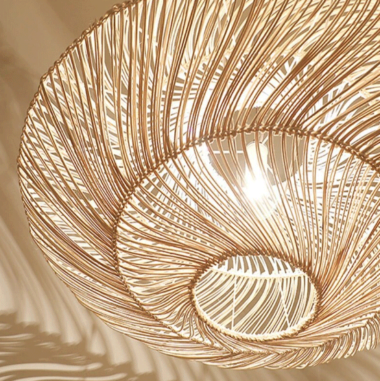  Handwoven bamboo saucer pendant lamp showing intricate weave patterns and organic design lines.  