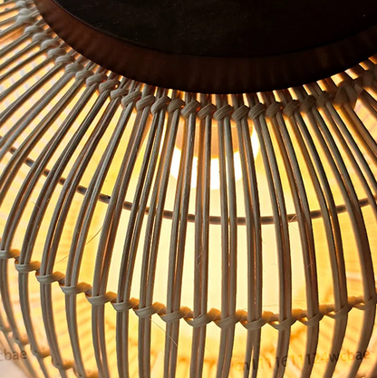 Artisan crafted rattan chandelier showcasing traditional vertical cane slat weaving in natural beige tone.