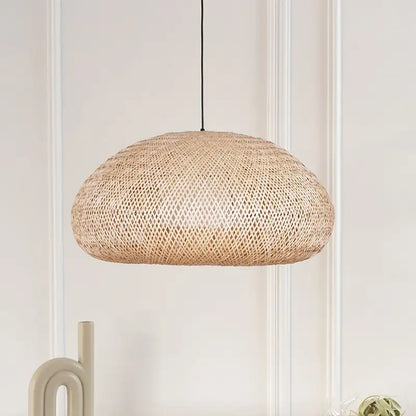 Sustainable handmade wicker hanging lamp with organic texture for eco-friendly home decor.