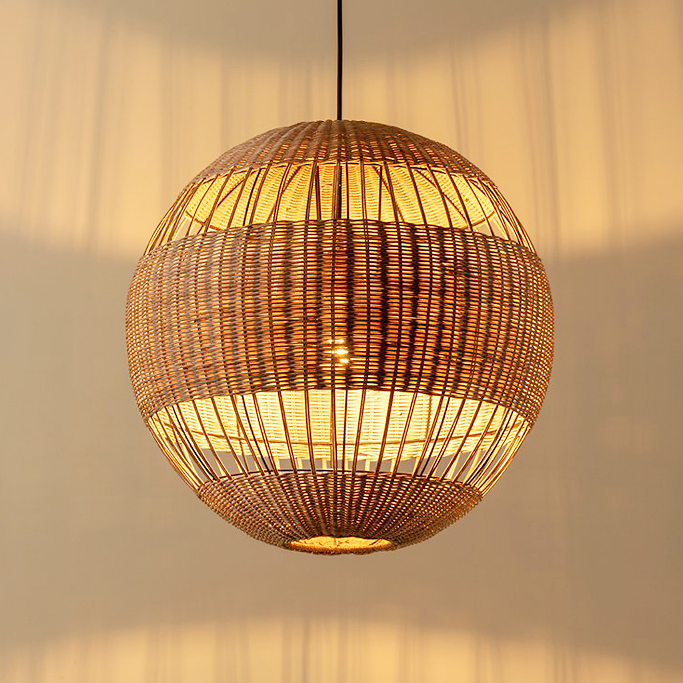 Eco-friendly hanging lamp crafted from woven jute fiber, perfect for a natural wellness space.