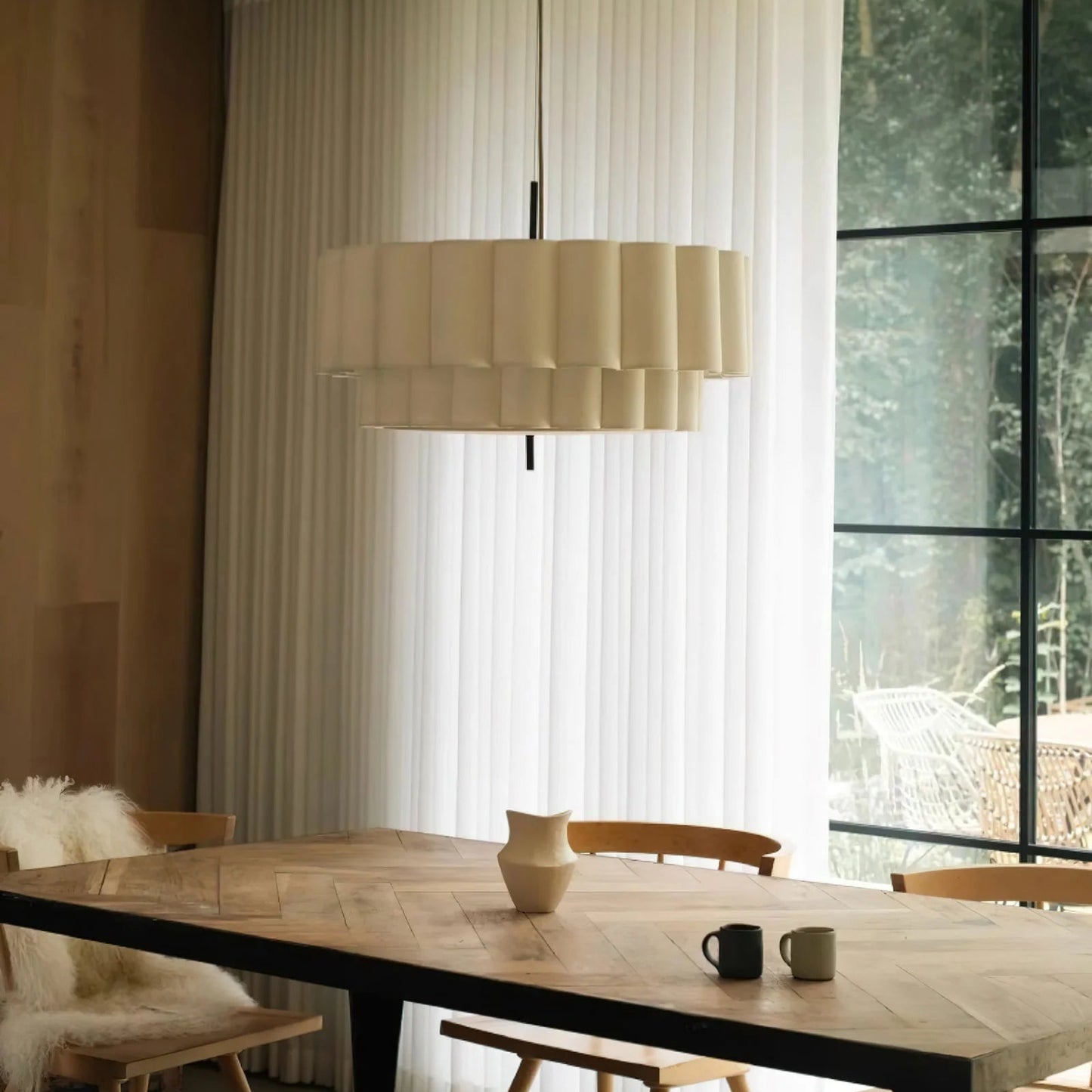 Hanging lamp with natural fabric texture, perfect for art rooms, providing gentle mood lighting for creative spaces.