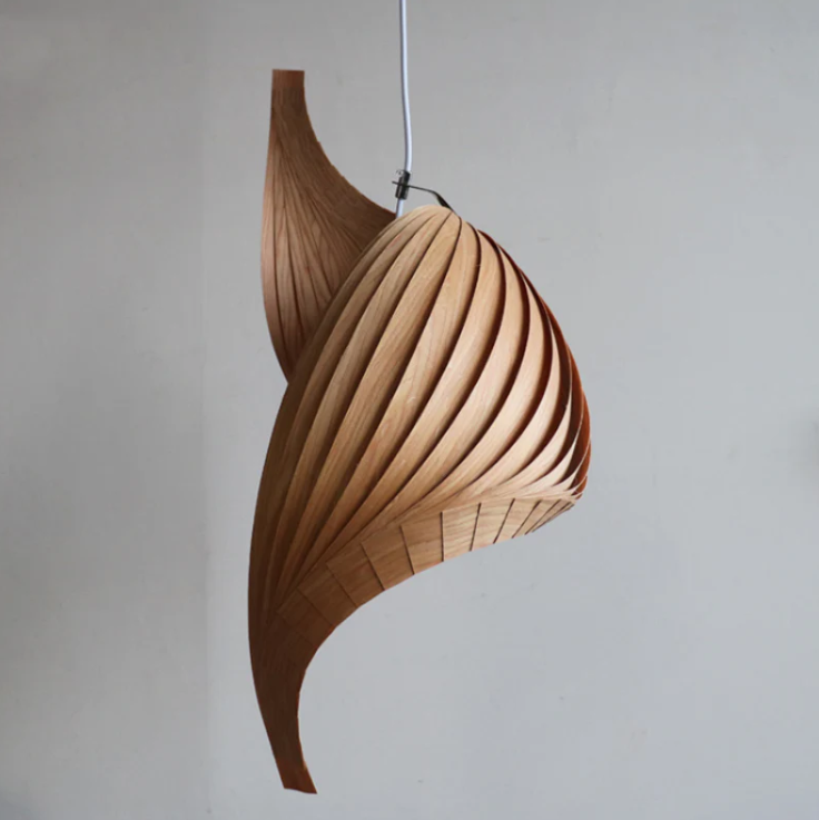Hanging lamp in Wabi-sabi style, wood material, perfect for unique dining table mood lighting.