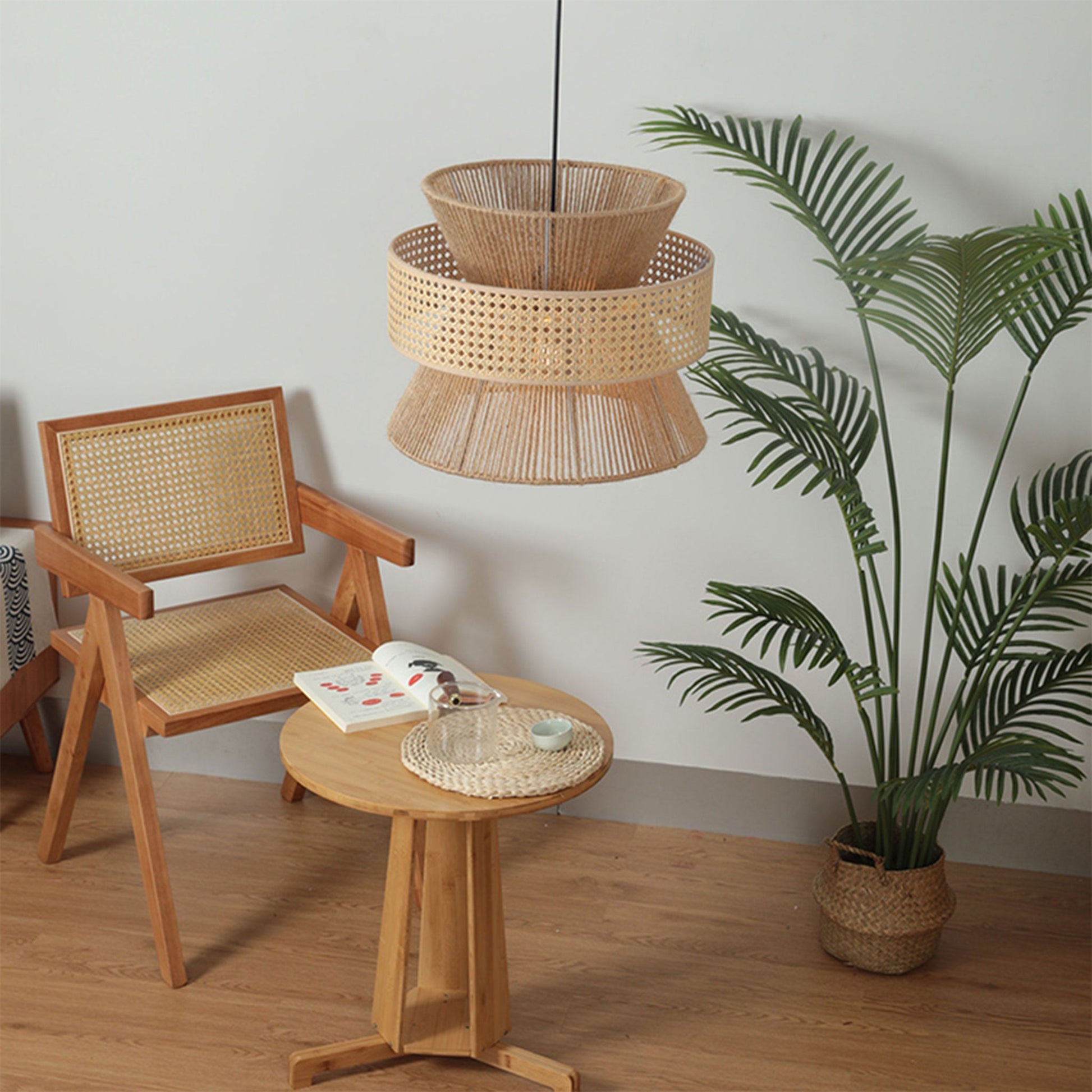 Premium bamboo tiered light shade bringing an upscale eco-resort and earthy luxury feeling to a contemporary high-end dining area.