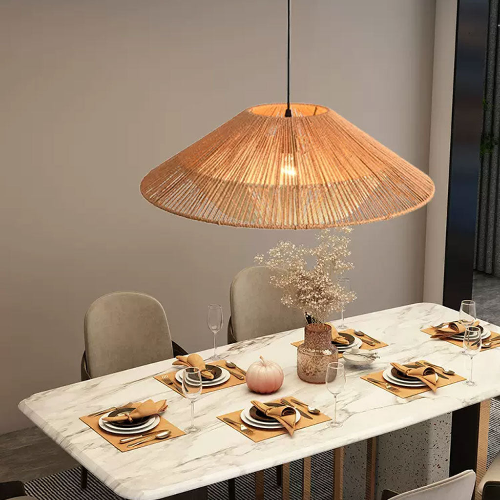 Minimalist natural fiber ceiling fixture casting a glare-free warm glow, ideal for kitchen island counter lighting.