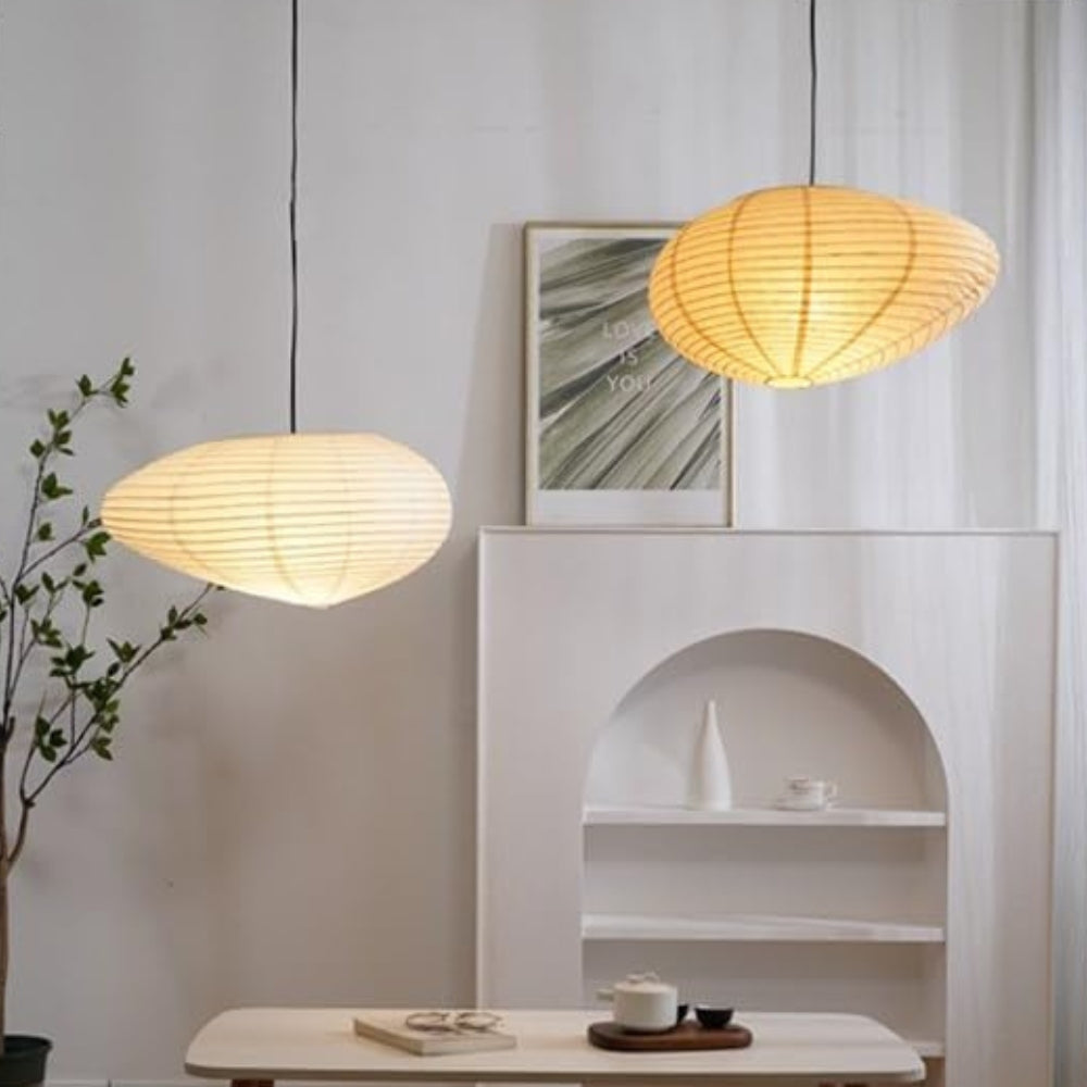 Minimalist Japandi rice paper hanging light with warm glow