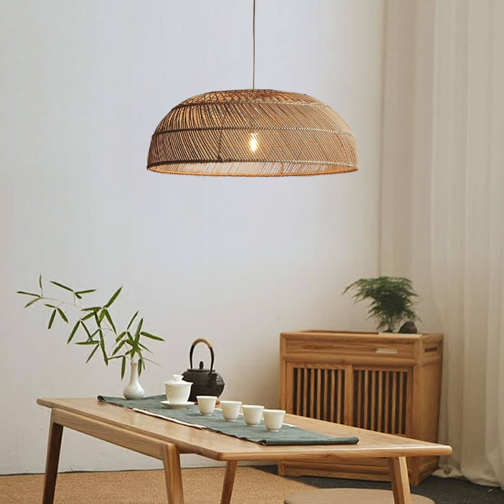 Japandi style rattan pendant light over a modern dining table