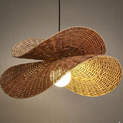 Japandi style rattan sculptural pendant light bringing a zen, wabi-sabi atmosphere to your living space.