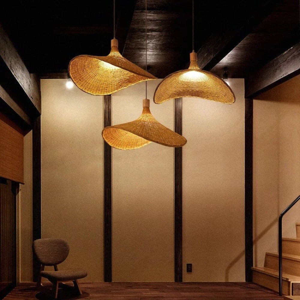 Minimalist Wabi-Sabi bamboo light fixture pairing beautifully with a modern teapot and ceramic dinnerware.