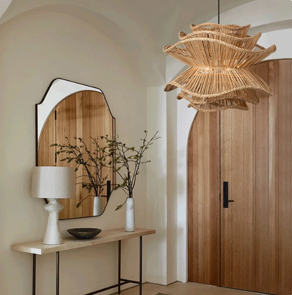 Handcrafted wavy rattan hanging light fixture perfect for a Nordic or Wabi-sabi dining room theme