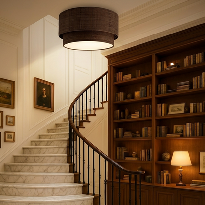 Mid-century inspired rattan flush mount, combining vintage texture with a clean and modern lamp form.