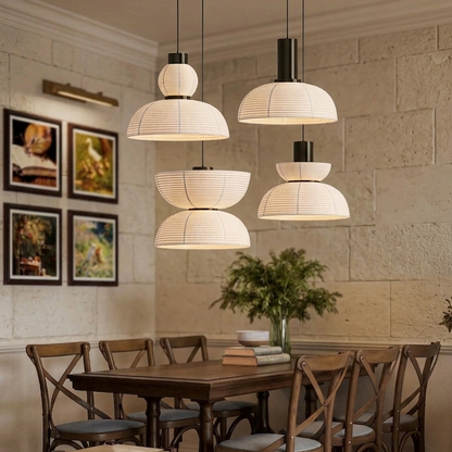 Minimalist Japandi style rice paper pendant light set creating a cozy dining room ambiance