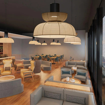 Minimalist Japandi rice paper pendant light set creating warm restaurant ambiance