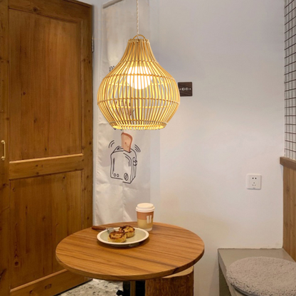 Minimalist organic hanging light made from sustainable rattan fibers