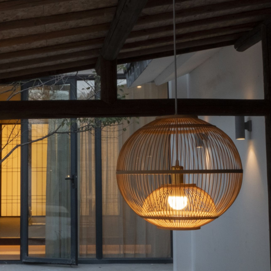 Minimalist woven bamboo lantern lamp for serene and calming home interiors
