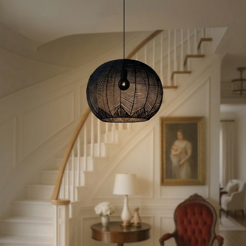 Handwoven rattan dome light illuminating a modern minimalist home entryway