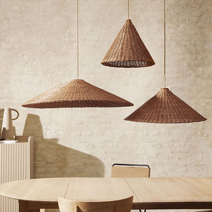 Elegant flared bamboo hanging lamps arranged in a staggered trio configuration to illuminate a contemporary oval wooden dining set.