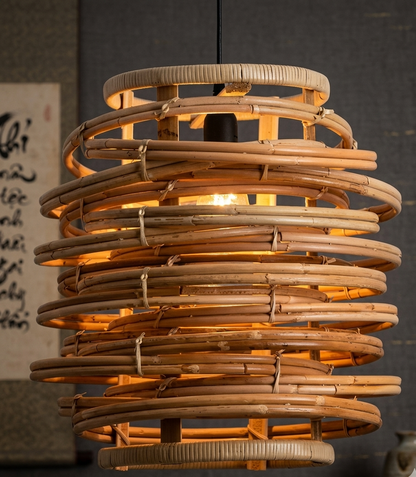 Modern natural rattan pendant light illuminating a stylish bar counter in a luxury resort.
