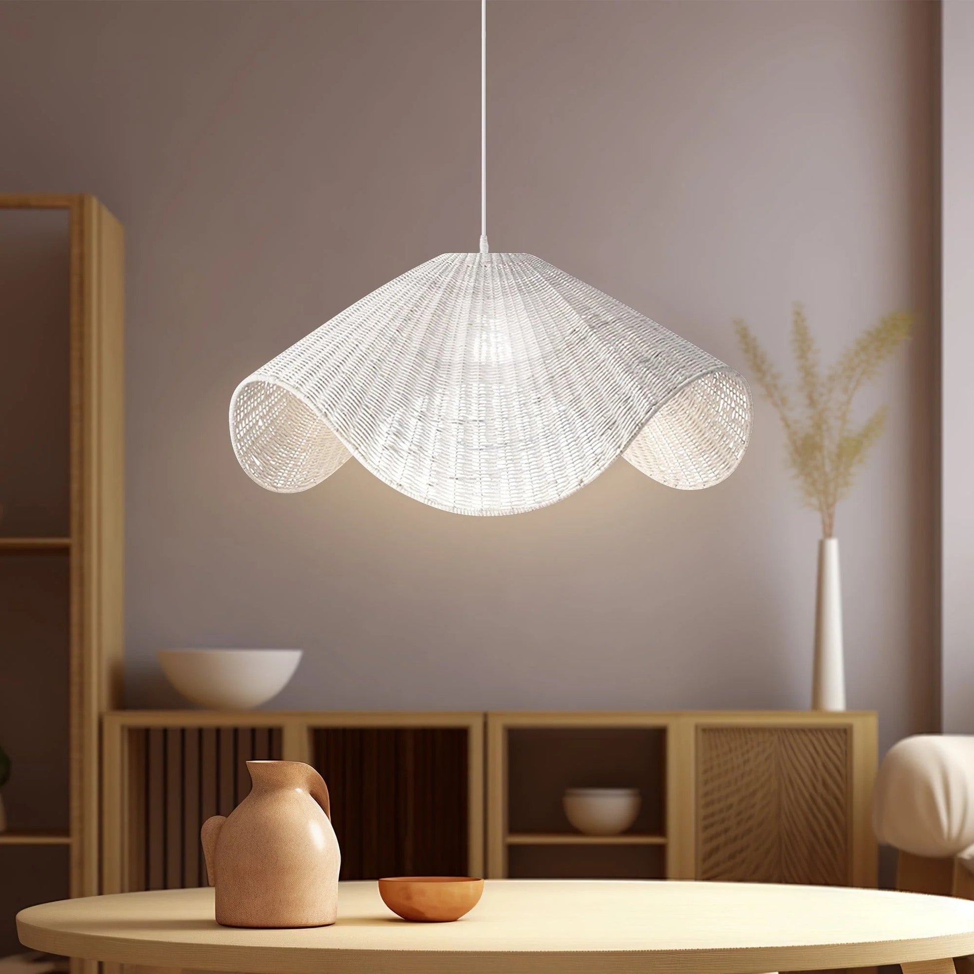 Natural woven pendant light illuminating the dining area with organic elegance