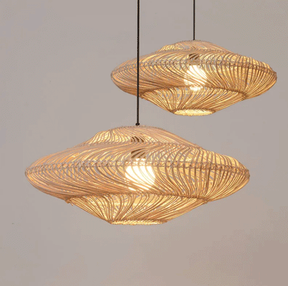 Organic woven ceiling light fixture made of natural bamboo fibers hanging in a minimalist interior