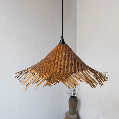 Organic hand-knotted bamboo fringe shade, a plastic-free and truly eco-friendly lighting fixture.