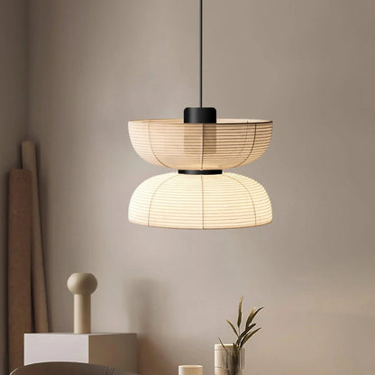 Organic shaped Japandi hanging paper lamp set in a dining room interior