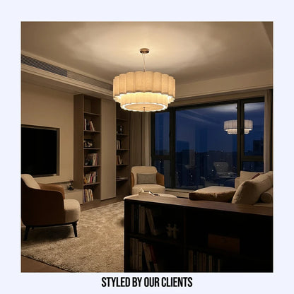 Pendant light featuring a handmade eco-friendly fabric design, perfect for a natural living room, providing ambient mood lighting.
