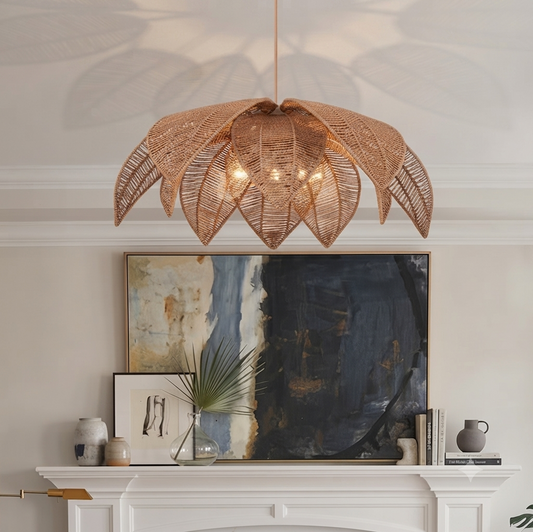 Pendant light featuring a handmade natural woven rattan leaf design, perfect for an eco-friendly living room, providing warm ambient mood lighting.