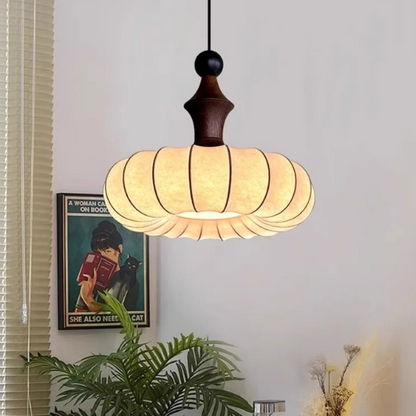 Pendant light in Minimalist style, featuring Wood Mix Cloth material, ideal for Nursery decor, providing ambient and task lighting.