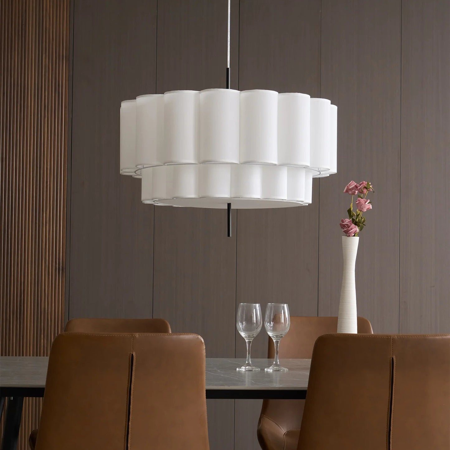 Pendant light made from natural fabric, perfect over dining tables, providing pleasant lighting for family meals.