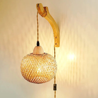 Woven wall light fixture with wooden arm on a neutral background