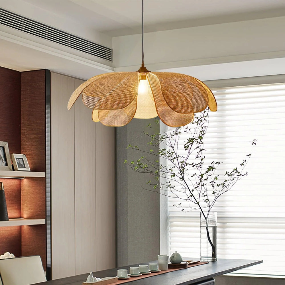 Sculptural layered rattan chandelier showcasing intricate woven grids and soft organic curves mimicking natural botanical forms.
